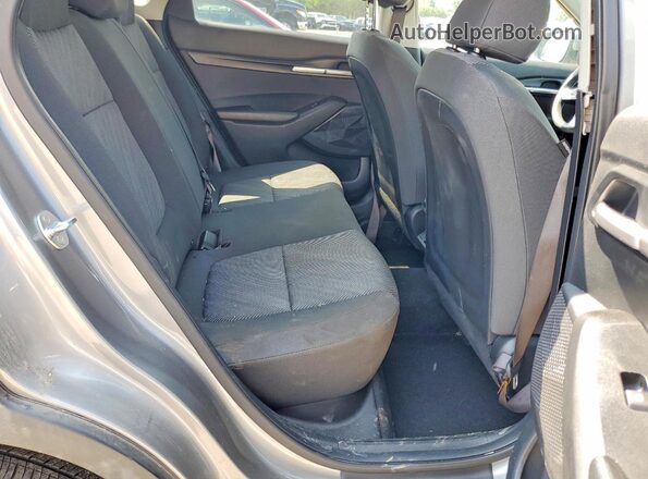 KNDEPCAA8S7710932 2025 KIA SELTOS Silver Rear interior view