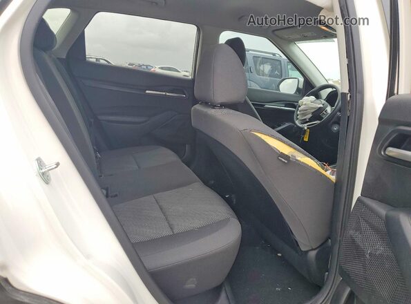 KNDEPCAAXP7456681 2023 KIA SELTOS White Vista de los asientos traseros