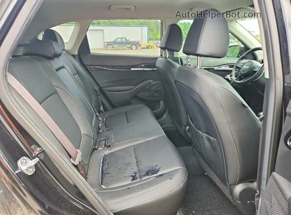 KNDER2AA6R7587372 2024 KIA SELTOS Black Вид задньої частини салону