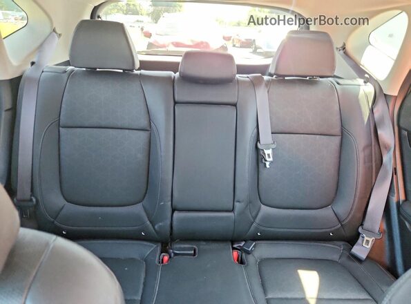 KNDERCAA2R7651588 2024 KIA SELTOS Black Rear seats view