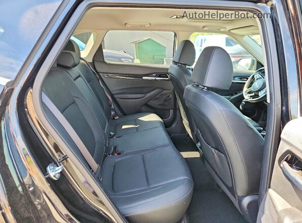 KNDERCAA2R7651588 2024 KIA SELTOS Black Rear interior view