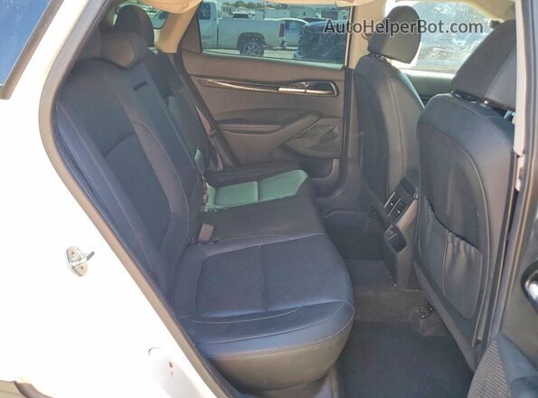 KNDERCAA4M7177152 2021 KIA SELTOS White Vista interior trasera