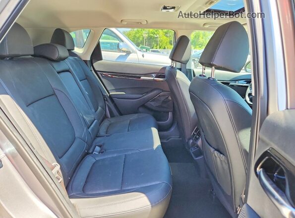 KNDERCAA4S7686073 2025 KIA SELTOS Silver Вид задньої частини салону