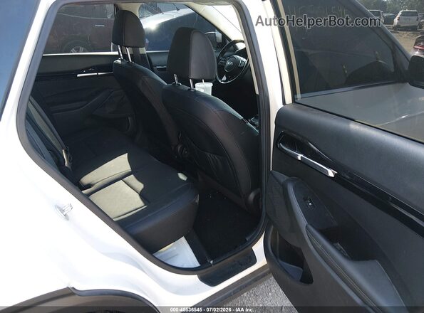 KNDERCAAXM7183943 2021 KIA SELTOS White Vista de la etiqueta del VIN