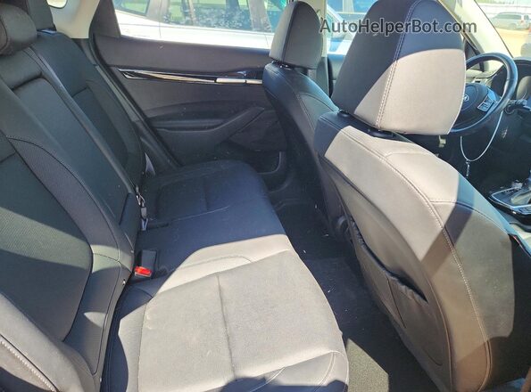 KNDETCA2XM7085117 2021 KIA SELTOS Silver უკანა სალონის ხედი