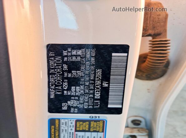 KNDETCA76R7520606 2024 KIA SELTOS White Vista de la etiqueta del VIN