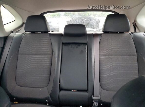 KNDEUCAAXM7077913 2021 KIA SELTOS Black Rear seats view