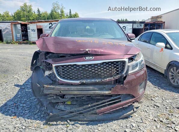 KNDMA5C12H6270730 2017 KIA SEDONA Burgundy Front view
