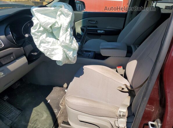 KNDMA5C12H6270730 2017 KIA SEDONA Burgundy Front interior view
