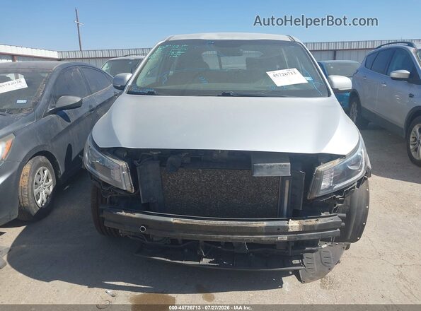 KNDMA5C15K6539665 2019 KIA SEDONA Серебряный Вид задней части салона