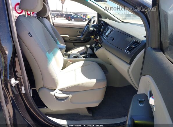 KNDMA5C18K6549672 2019 KIA SEDONA Черный Вид салона спереди