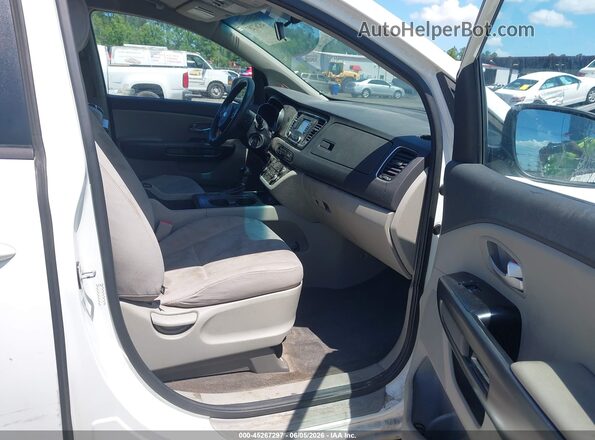 KNDMB5C10G6119588 2016 KIA SEDONA White Front interior view