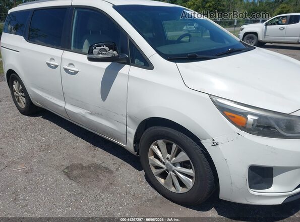 KNDMB5C10G6119588 2016 KIA SEDONA White Front view