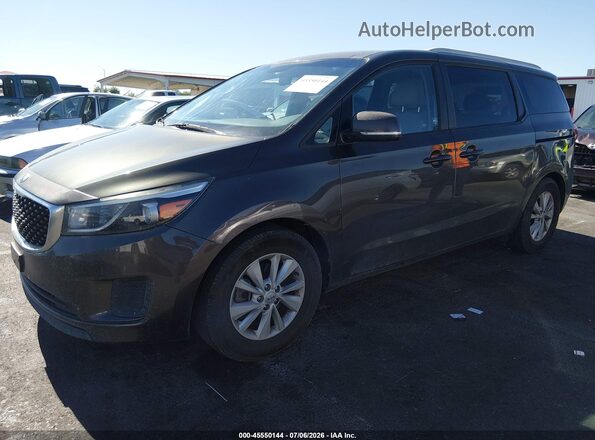KNDMB5C10G6178673 2016 KIA SEDONA Dark Brown Vista tres cuartos delantera izquierda