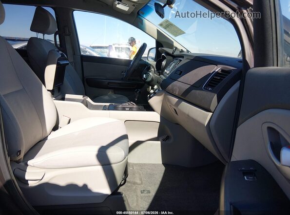 KNDMB5C10G6178673 2016 KIA SEDONA Dark Brown Vista interior delantera