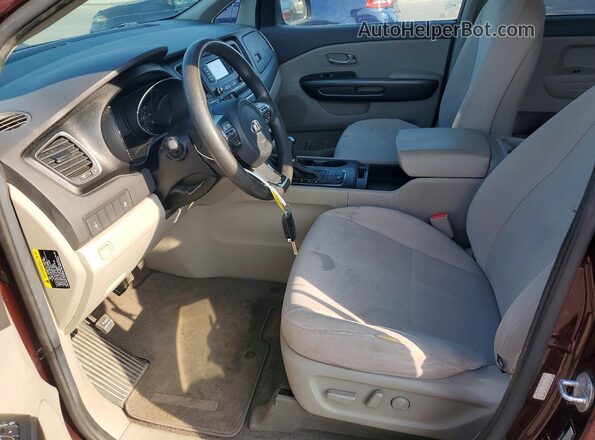 KNDMB5C10H6241157 2017 KIA SEDONA Burgundy წინა სალონის ხედი