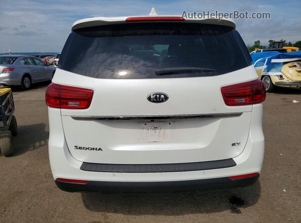 KNDMB5C10K6538243 2019 KIA SEDONA White Rear view