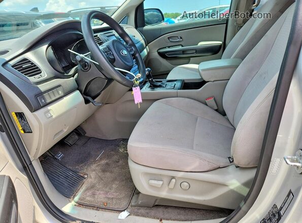 KNDMB5C11G6120989 2016 KIA SEDONA Silver წინა სალონის ხედი