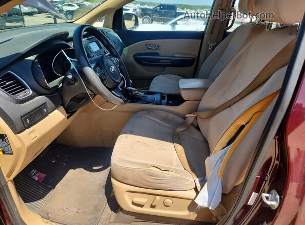 KNDMB5C11G6128834 2016 KIA SEDONA Maroon Вид салону спереду