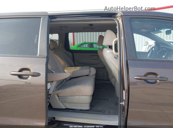 KNDMB5C11G6165897 2016 KIA SEDONA Brown VIN sticker view