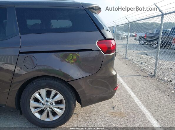 KNDMB5C11G6165897 2016 KIA SEDONA Brown Front view