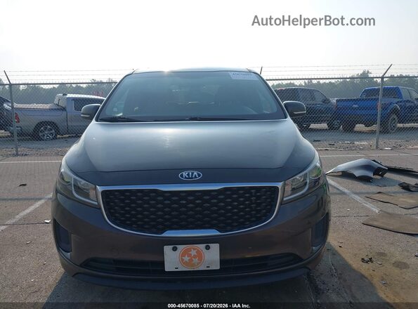 KNDMB5C11G6165897 2016 KIA SEDONA Brown Rear interior view
