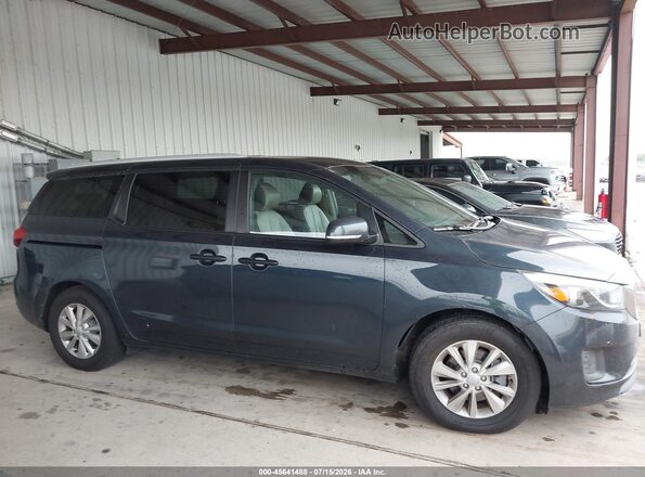 KNDMB5C11H6266570 2017 KIA SEDONA Blue Вид задньої частини салону