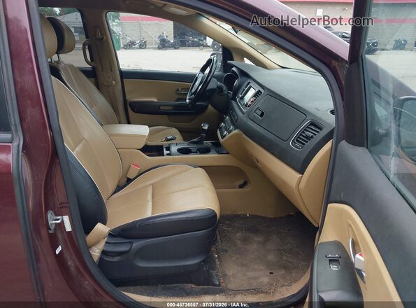 KNDMB5C11H6284681 2017 KIA SEDONA Burgundy Front interior view