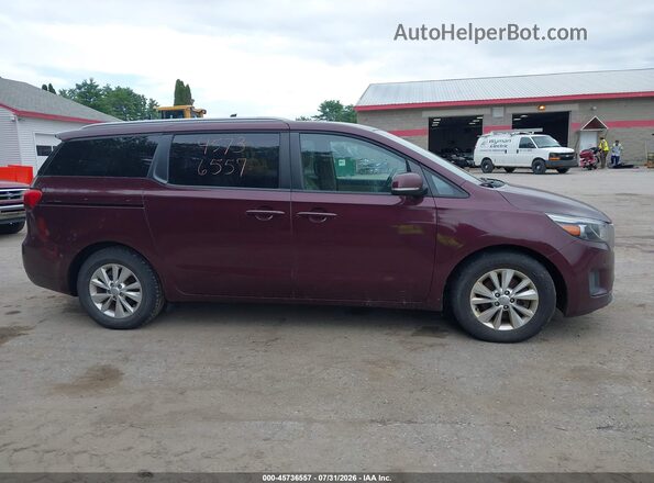 KNDMB5C11H6284681 2017 KIA SEDONA Burgundy Rear interior view