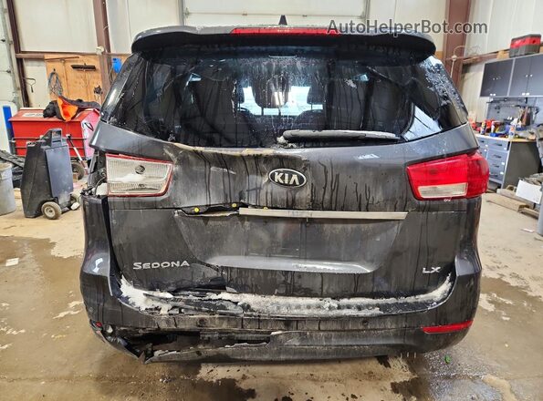 KNDMB5C11H6290853 2017 KIA SEDONA Black Widok z tyłu