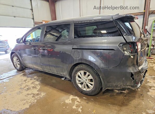 KNDMB5C11H6290853 2017 KIA SEDONA Black Tył lewy
