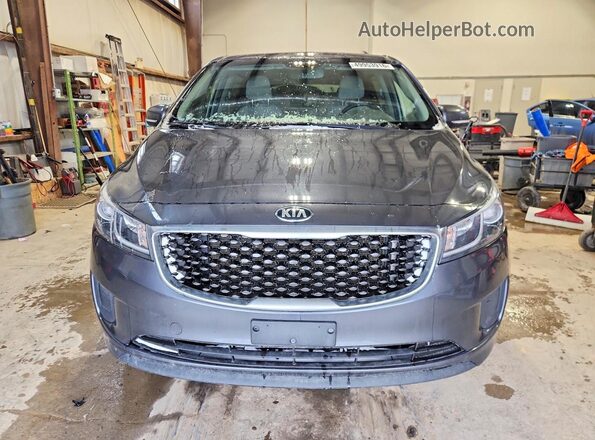 KNDMB5C11H6290853 2017 KIA SEDONA Black Widok z przodu