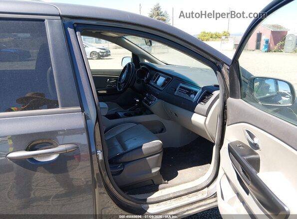 KNDMB5C11H6339436 2017 KIA SEDONA Black Вид салону спереду