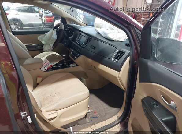 KNDMB5C11K6564981 2019 KIA SEDONA Бордовый Вид салона спереди