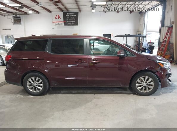 KNDMB5C11K6564981 2019 KIA SEDONA Бордовый Вид задней части салона