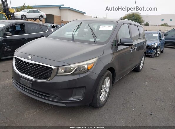 KNDMB5C12G6085024 2016 KIA SEDONA Black Առջևի ձախ երեք քառորդ տեսարան