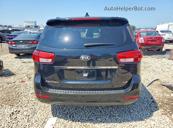 KNDMB5C12G6091065 2016 KIA SEDONA Black უკანა ხედი