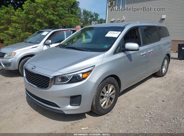 KNDMB5C12G6163222 2016 KIA SEDONA Gray Առջևի ձախ երեք քառորդ տեսարան