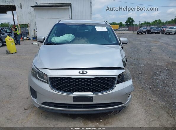 KNDMB5C12H6218429 2017 KIA SEDONA Silver Rear interior view