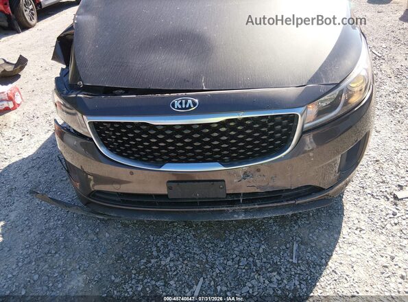 KNDMB5C12H6314271 2017 KIA SEDONA Gray Դիմացի տեսք