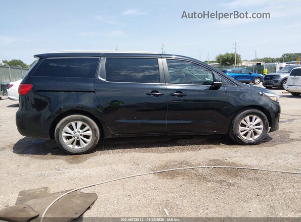 KNDMB5C12H6320510 2017 KIA SEDONA Black Սալոնի հետևի տեսք