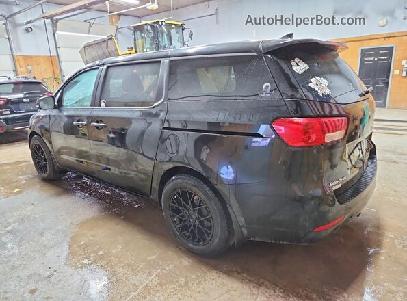 KNDMB5C12J6407099 2018 KIA SEDONA Black Trasero izquierdo