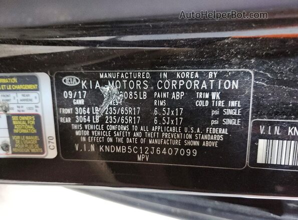 KNDMB5C12J6407099 2018 KIA SEDONA Black Vista de la etiqueta del VIN