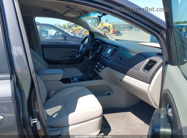 KNDMB5C13G6189523 2016 KIA SEDONA Black Вид салону спереду