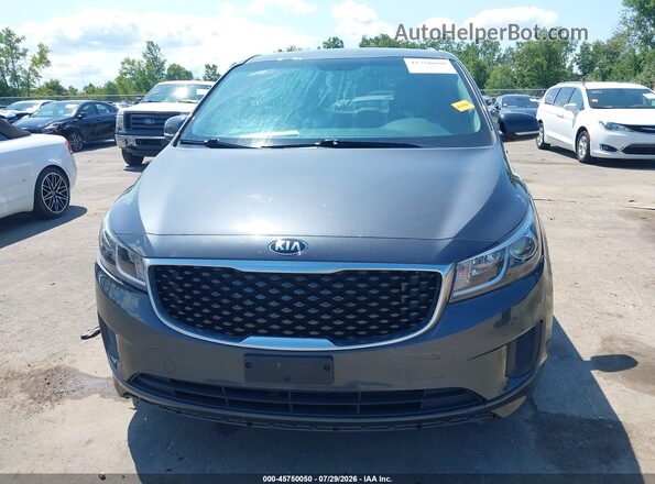 KNDMB5C13G6189523 2016 KIA SEDONA Black Вид задньої частини салону