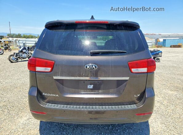 KNDMB5C13G6197833 2016 KIA SEDONA Gray Հետևի տեսք