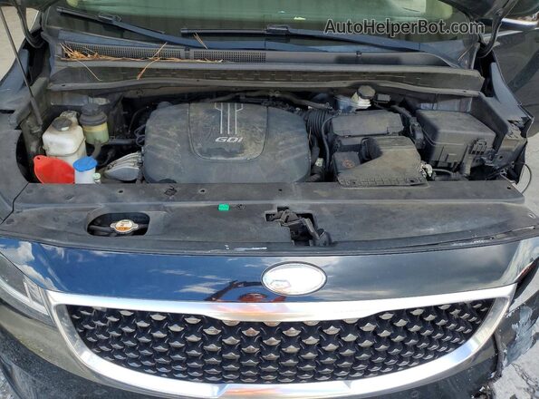 KNDMB5C13J6400596 2018 KIA SEDONA Black Rear interior view