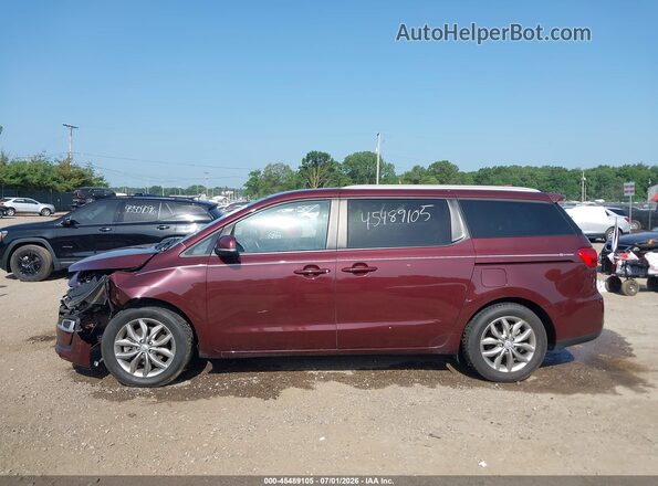 KNDMB5C13K6541816 2019 KIA SEDONA Maroon Սալոնի հետևի տեսք