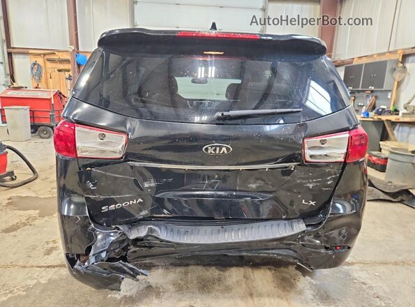 KNDMB5C14H6249942 2017 KIA SEDONA Black Հետևի տեսք