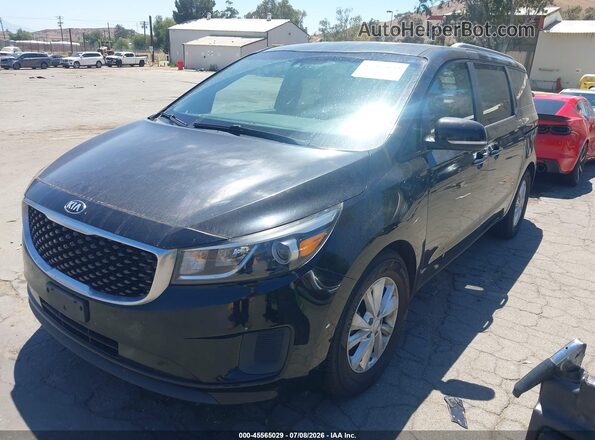 KNDMB5C14H6324929 2017 KIA SEDONA Black Առջևի ձախ երեք քառորդ տեսարան